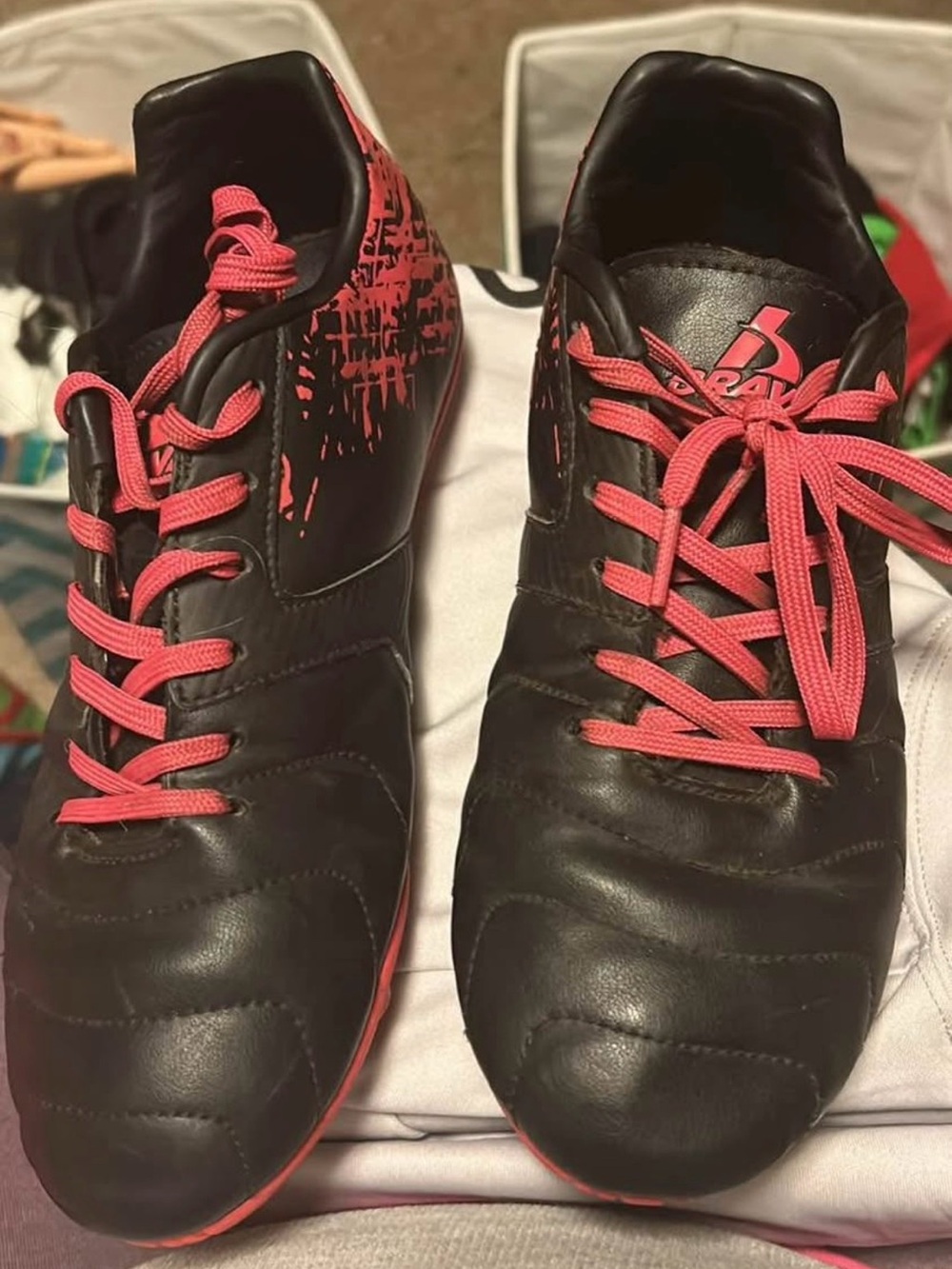 Girl soccer cleats and shin guards
